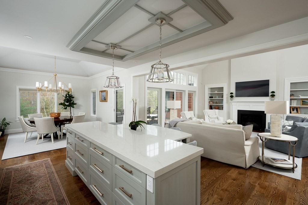 155 Black Rock Drive, Unit 155 Hingham, MA 02043 - Photo 13 of 42 a view of living room with kitchen island furniture and fireplace