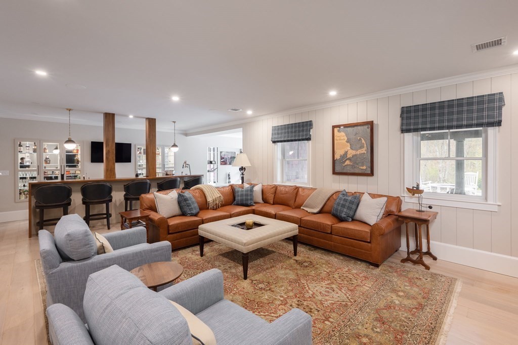 155 Black Rock Drive, Unit 155 Hingham, MA 02043 - Photo 32 of 42 a living room with furniture and a window