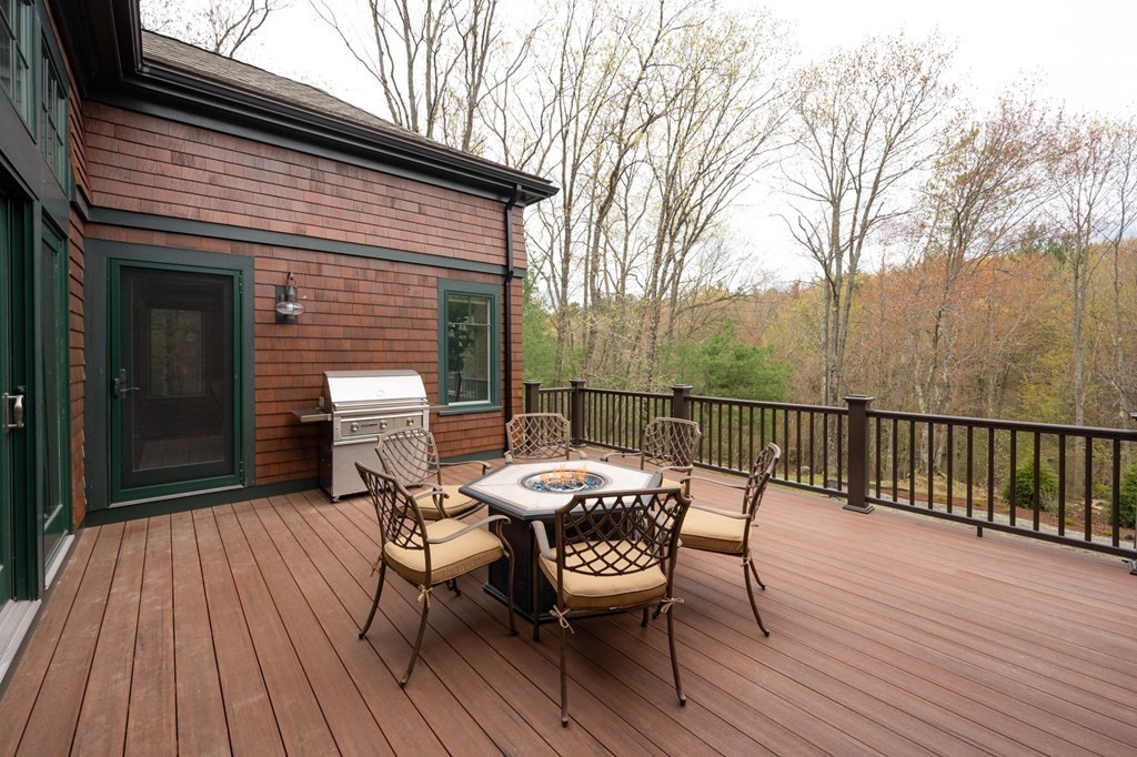 155 Black Rock Drive, Unit 155 Hingham, MA 02043 - Photo 37 of 42 a patio with wooden floor and outdoor seating