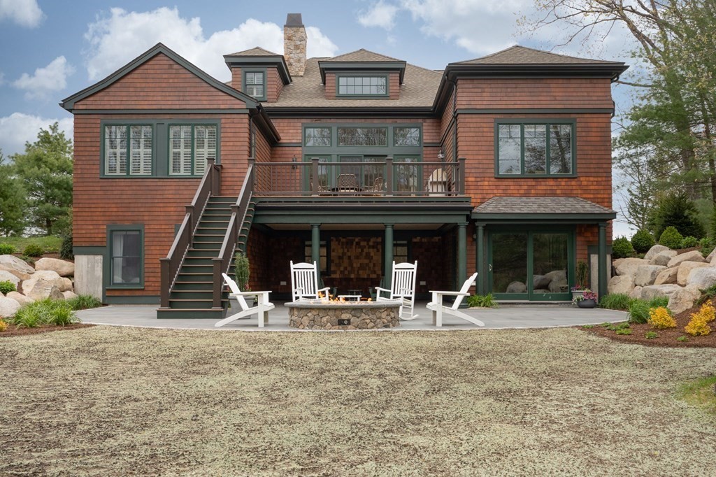 155 Black Rock Drive, Unit 155 Hingham, MA 02043 - Photo 39 of 42 a view of a building with chair and front view of a house