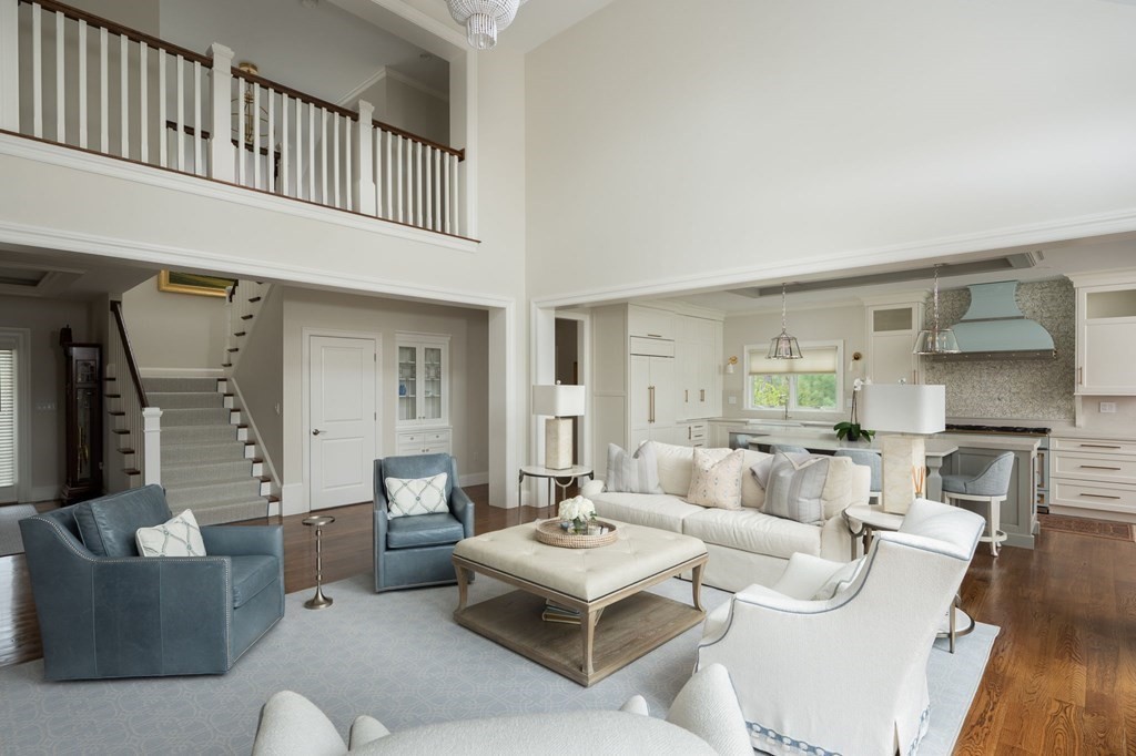 155 Black Rock Drive, Unit 155 Hingham, MA 02043 - Photo 7 of 42 a living room with furniture and a fireplace