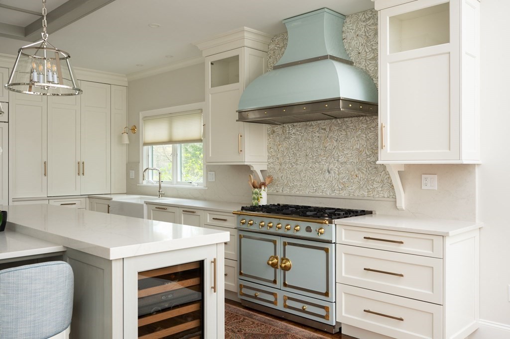 155 Black Rock Drive, Unit 155 Hingham, MA 02043 - Photo 8 of 42 a kitchen with granite countertop a stove and a sink