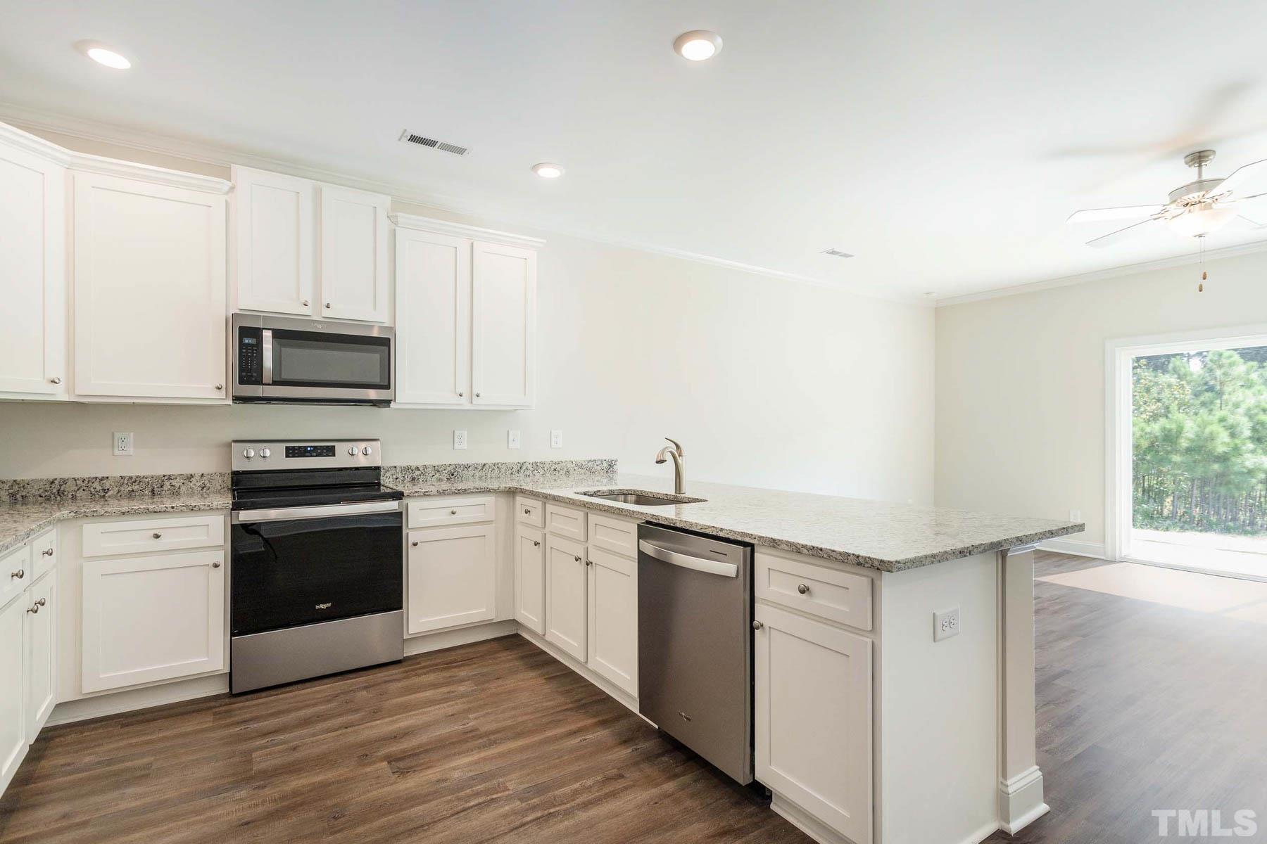 6944 Outfall Point Lane Raleigh, NC 27616 - Photo 4 of 16