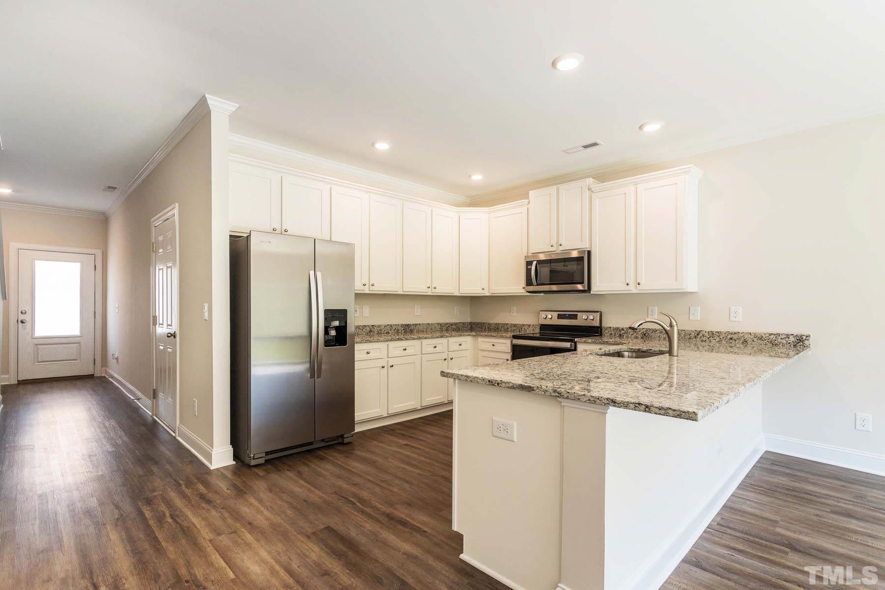 6944 Outfall Point Lane Raleigh, NC 27616 - Photo 7 of 16