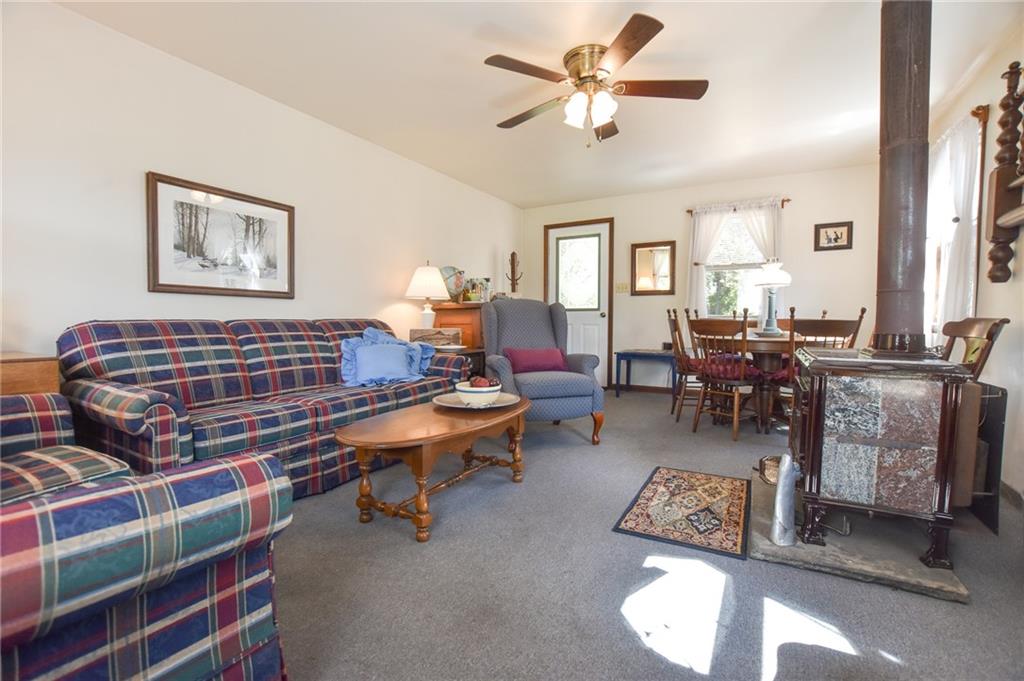 315 4th Street Freeport, PA 16229 - Photo 16 of 17 a living room with furniture a chandelier and a window