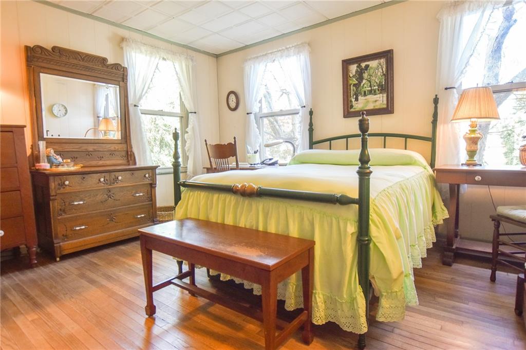 315 4th Street Freeport, PA 16229 - Photo 8 of 17 a bedroom with a bed and wooden floor