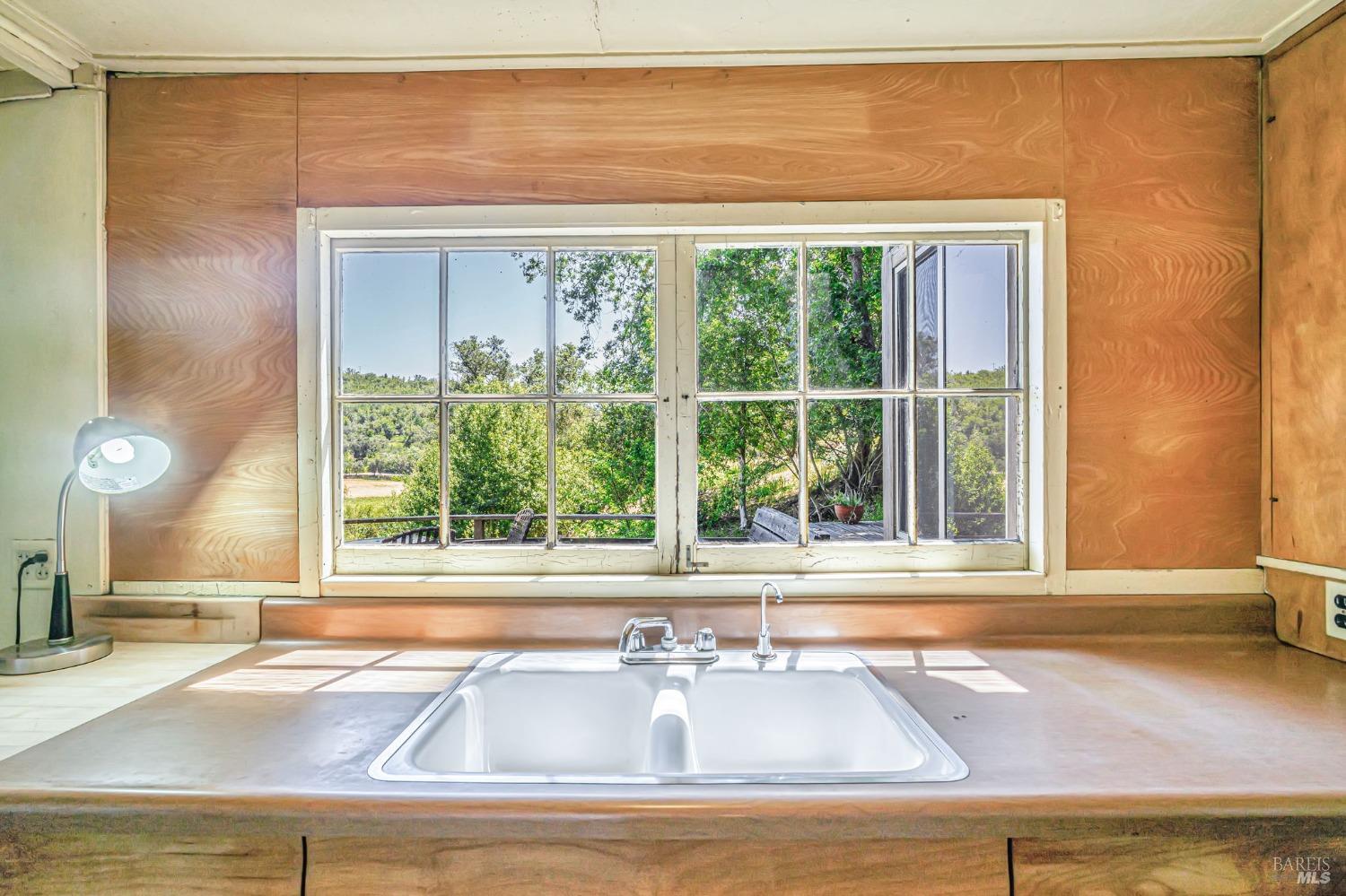 1561 South Fitch Mountain Road Healdsburg, CA 95448 - Photo 17 of 44 a view of a sink and a window