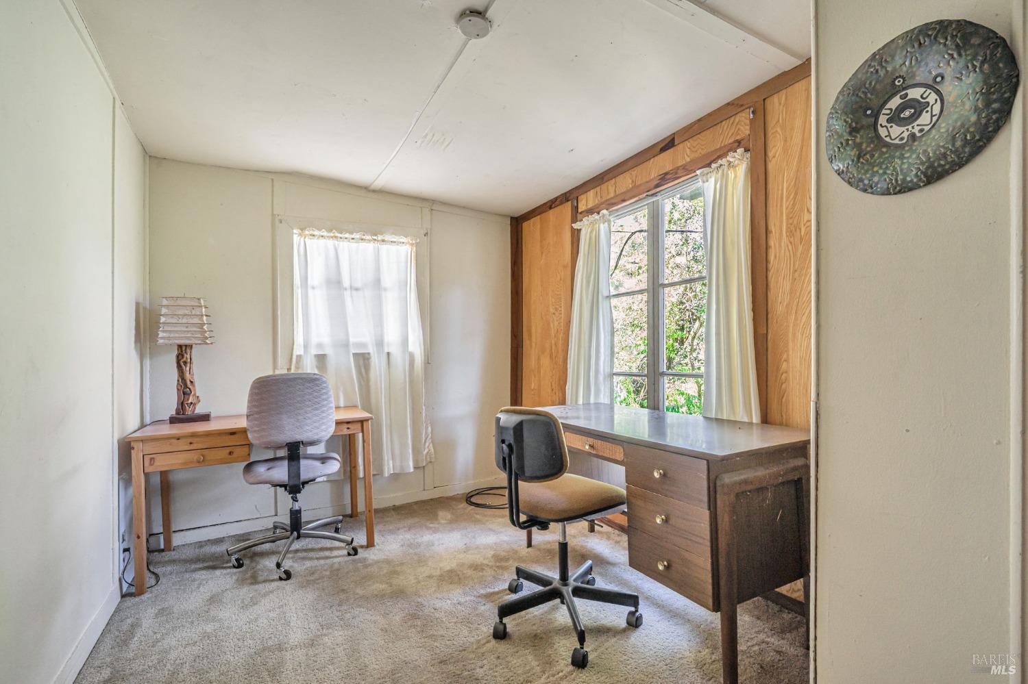 1561 South Fitch Mountain Road Healdsburg, CA 95448 - Photo 21 of 44 a view of a workspace with furniture and a window