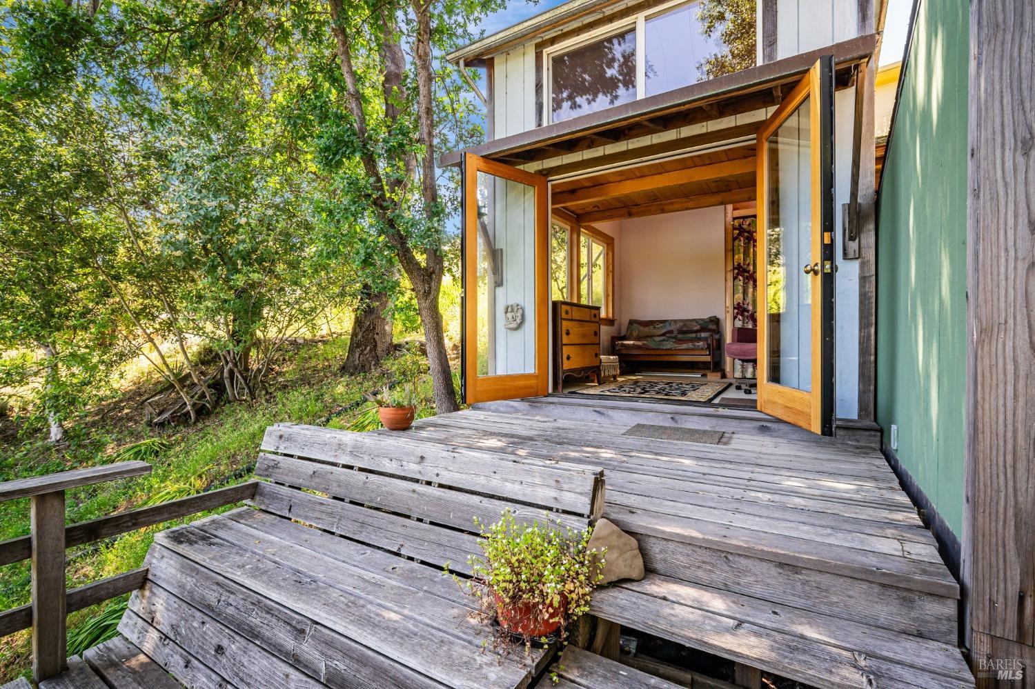 1561 South Fitch Mountain Road Healdsburg, CA 95448 - Photo 30 of 44 a view of a wooden chairs on the balcony