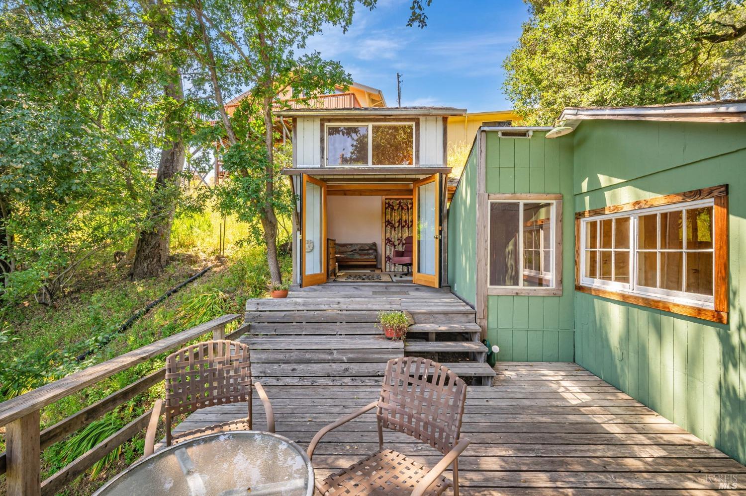 1561 South Fitch Mountain Road Healdsburg, CA 95448 - Photo 32 of 44 a view of a house with backyard and sitting area