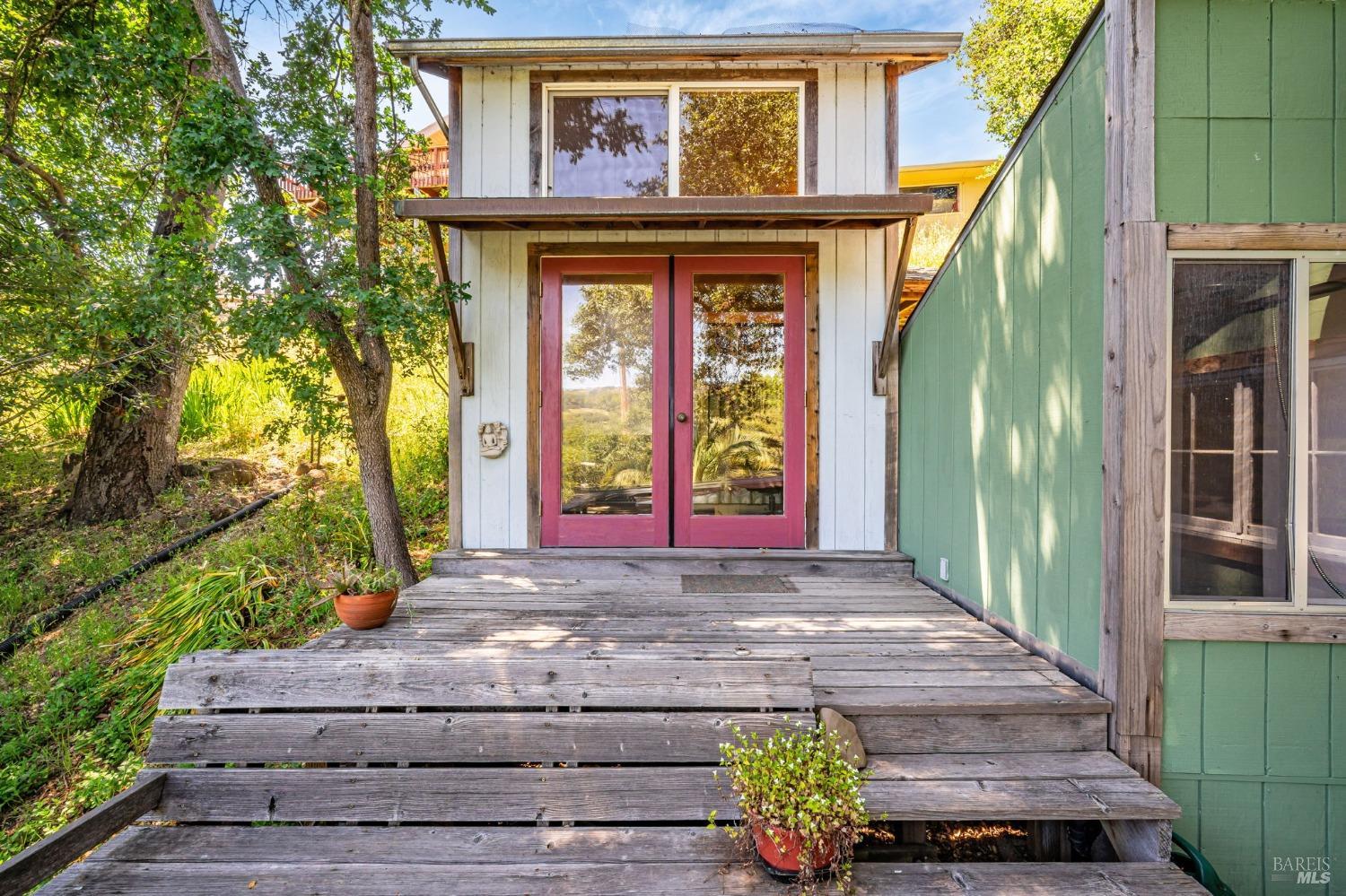 1561 South Fitch Mountain Road Healdsburg, CA 95448 - Photo 34 of 44 a front view of a house with garden