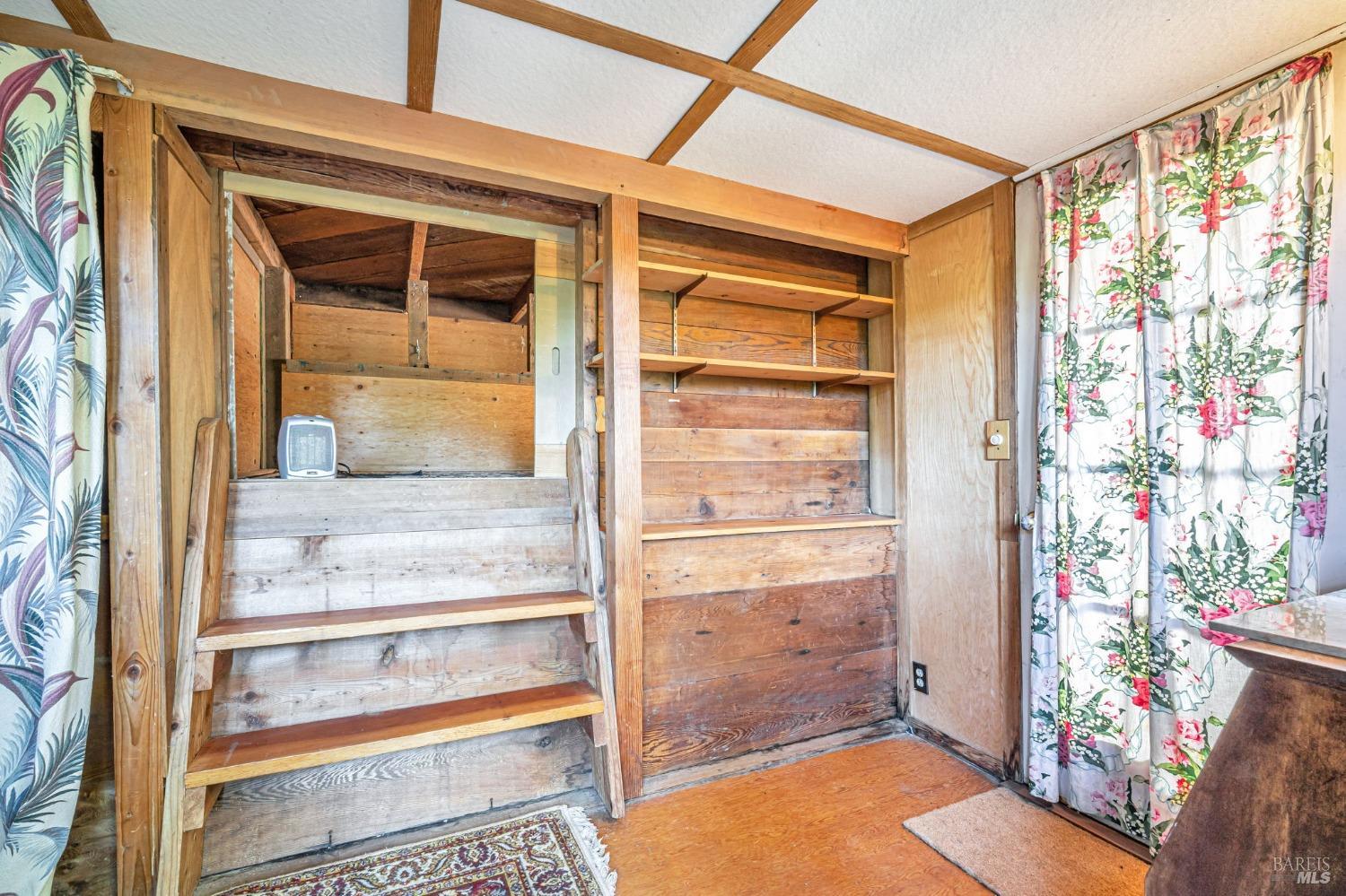 1561 South Fitch Mountain Road Healdsburg, CA 95448 - Photo 44 of 44 a view of walk in closet with empty racks
