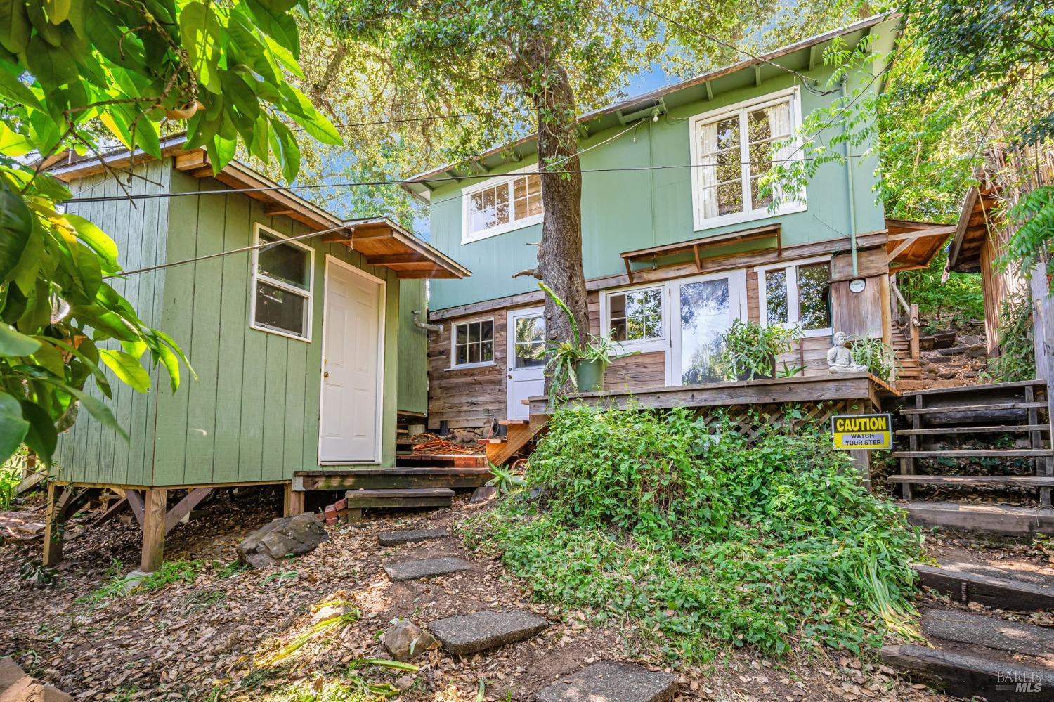 1561 South Fitch Mountain Road Healdsburg, CA 95448 - Photo 5 of 44 a view of a house with a yard