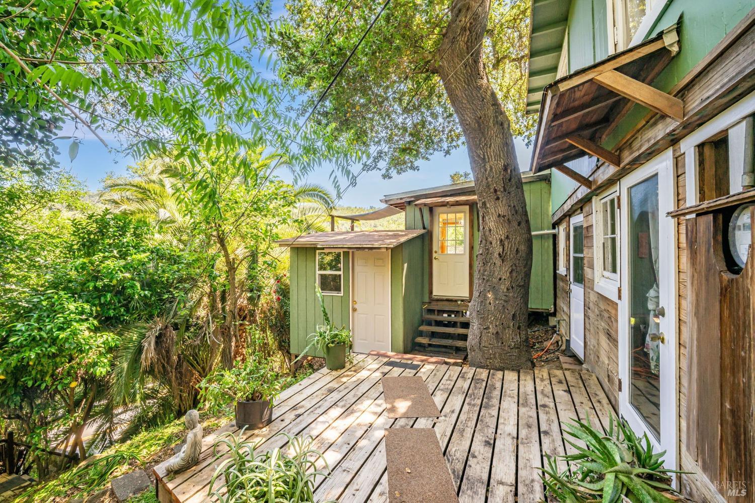 1561 South Fitch Mountain Road Healdsburg, CA 95448 - Photo 8 of 44 a view of a house with a yard