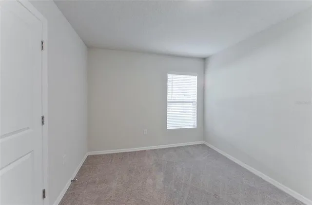 a view of empty room with window