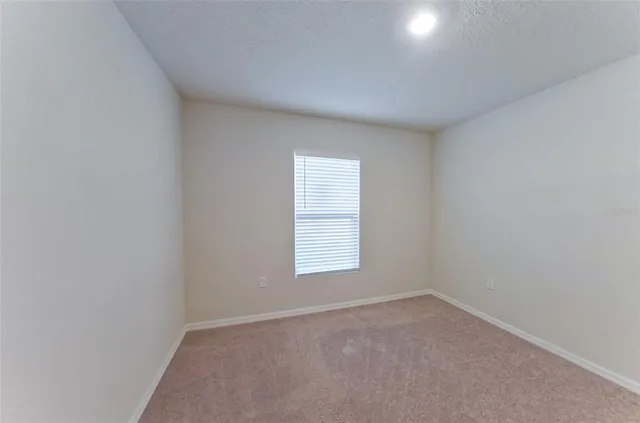 a view of a window in an empty room