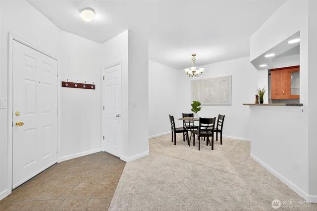 a view of a dining room with furniture