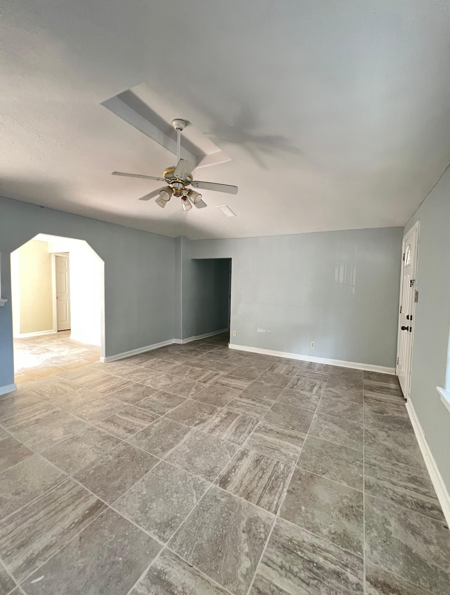 3121 Bond Street Pasadena, TX 77503 - Photo 3 of 16 a view of a livingroom with a ceiling fan and window