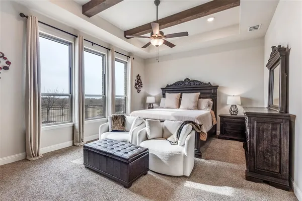 a bathroom with a shower and a sink