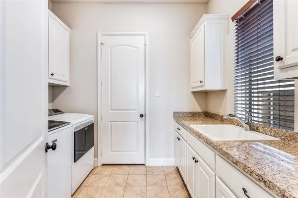 a view of a livingroom with furniture and a table