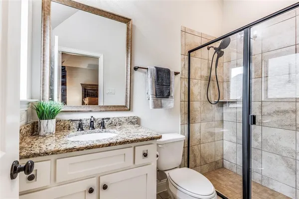 a living room with furniture fireplace and a flat screen tv