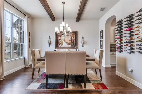a living room with furniture fireplace and flat screen tv