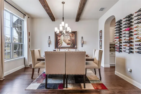 a living room with furniture fireplace and flat screen tv