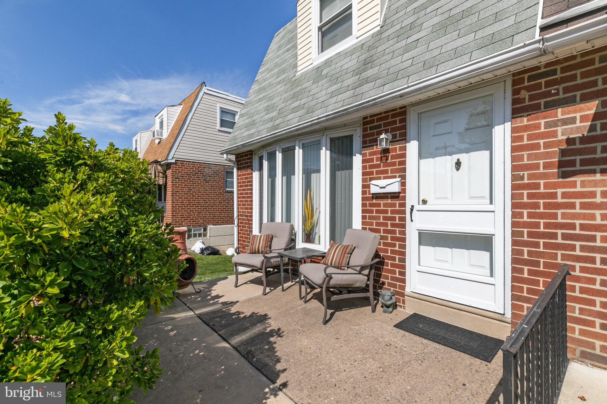 3405 Primrose Road Philadelphia, PA 19114 - Photo 1 of 17 a backyard of a house with outdoor seating