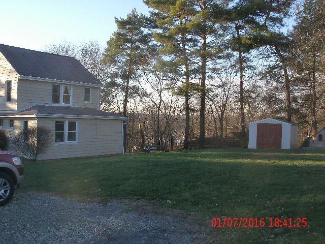 782 Elk Avenue Rochester, PA 15074 - Photo 2 of 23 Back of house from parking area. note level yard area.