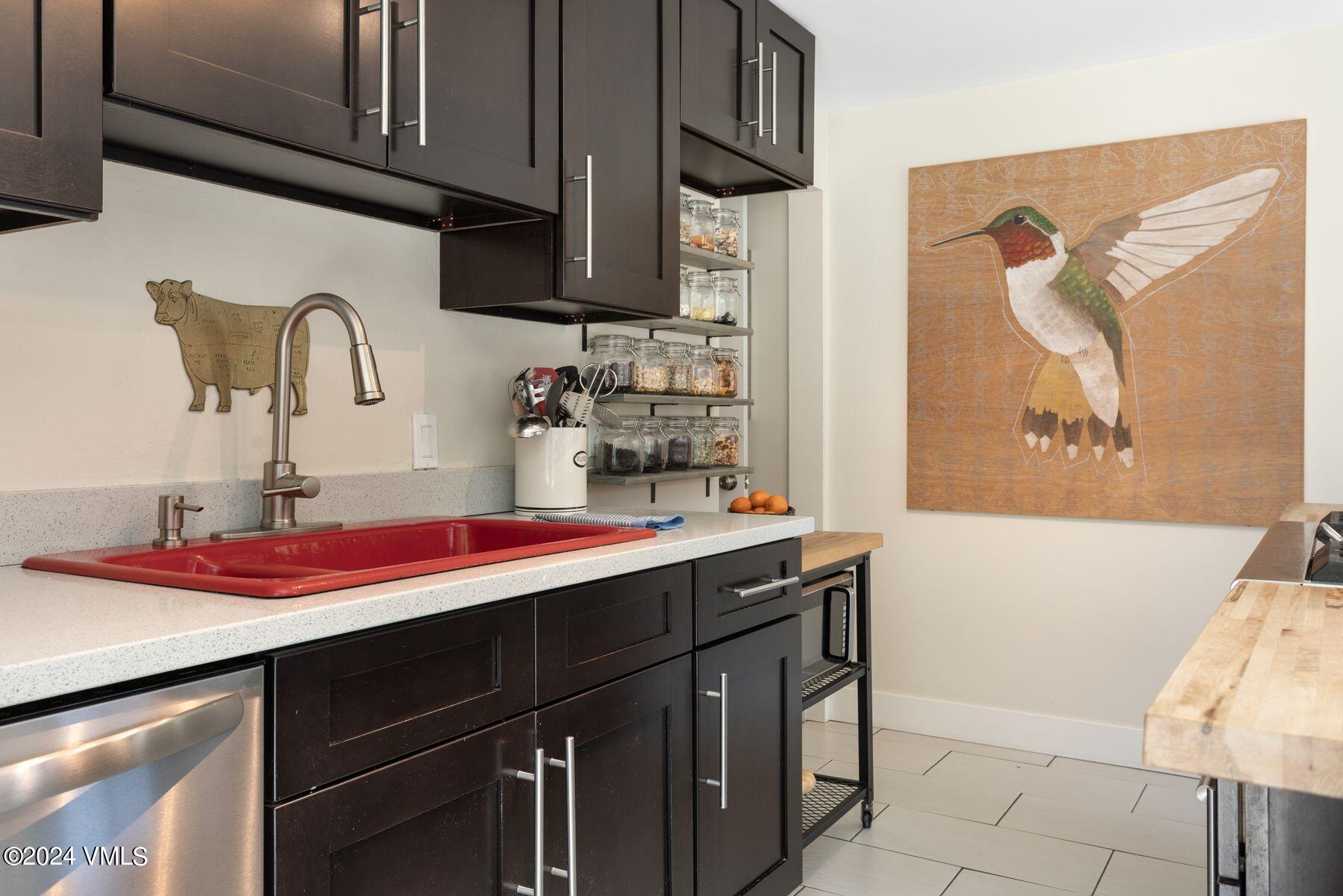 245 Pine Street Minturn, CO 81645 - Photo 12 of 44 a kitchen with a sink and cabinets