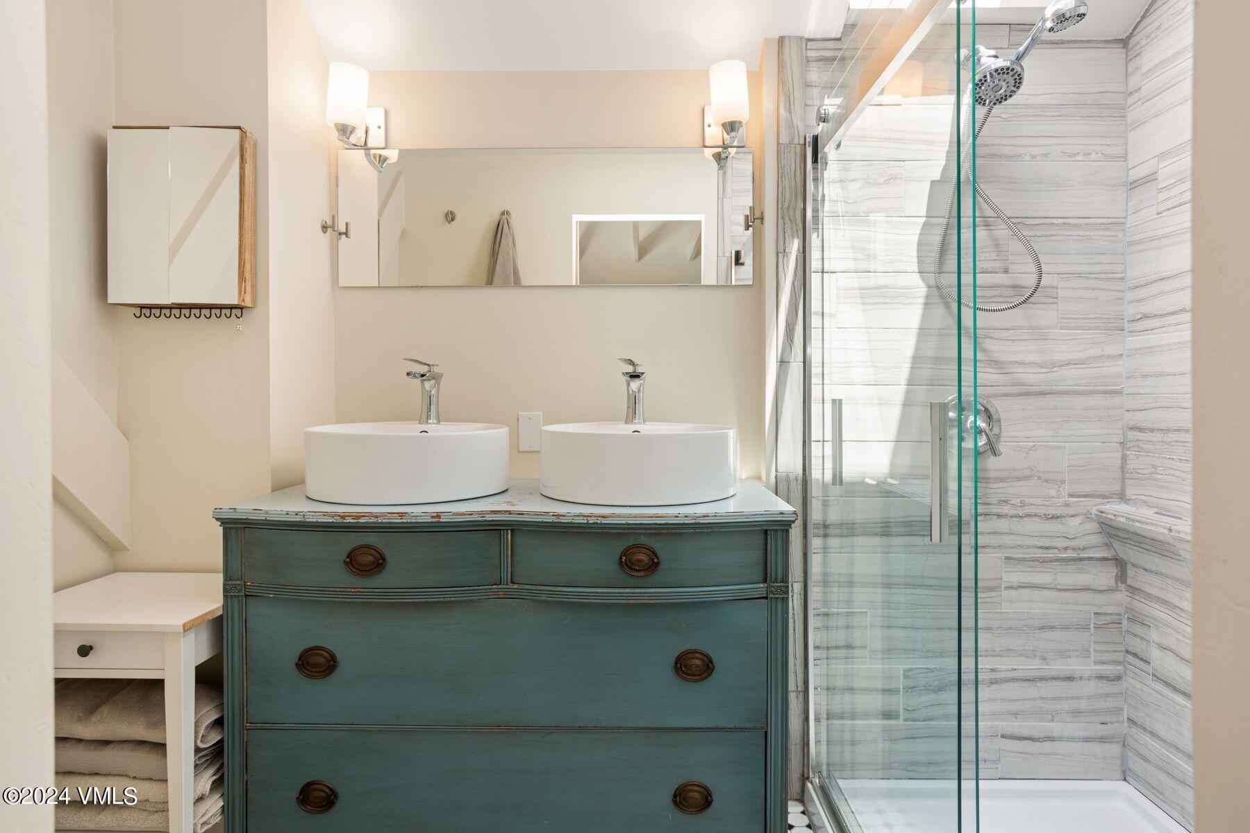 245 Pine Street Minturn, CO 81645 - Photo 14 of 44 a bathroom with a sink and a mirror