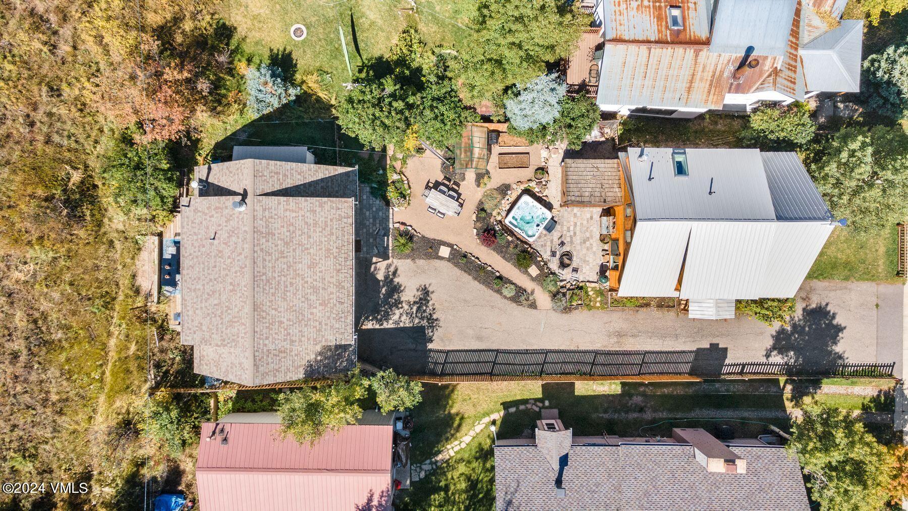245 Pine Street Minturn, CO 81645 - Photo 40 of 44 an aerial view of a house with a yard and seating space