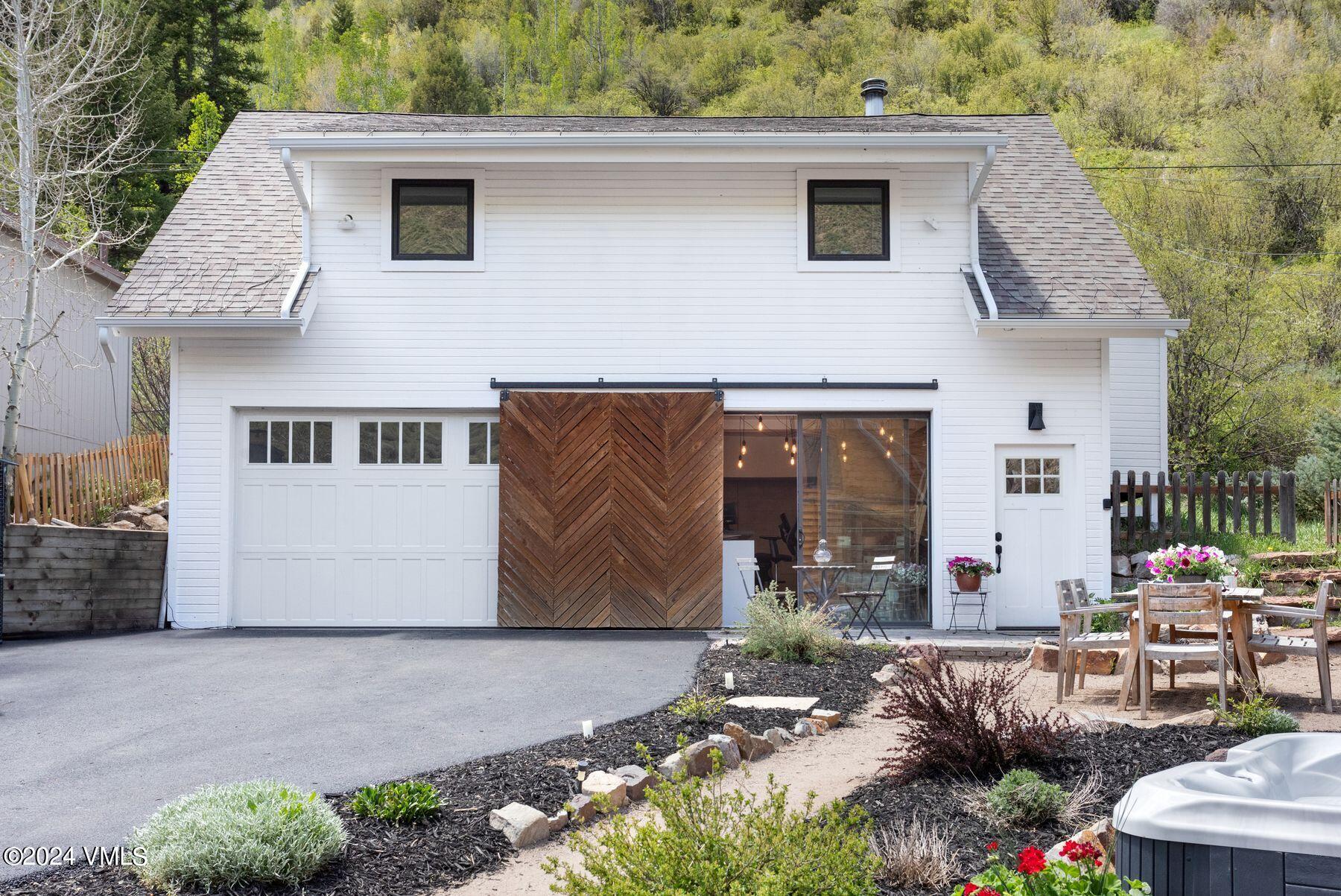245 Pine Street Minturn, CO 81645 - Photo 5 of 44 a front view of house with yard