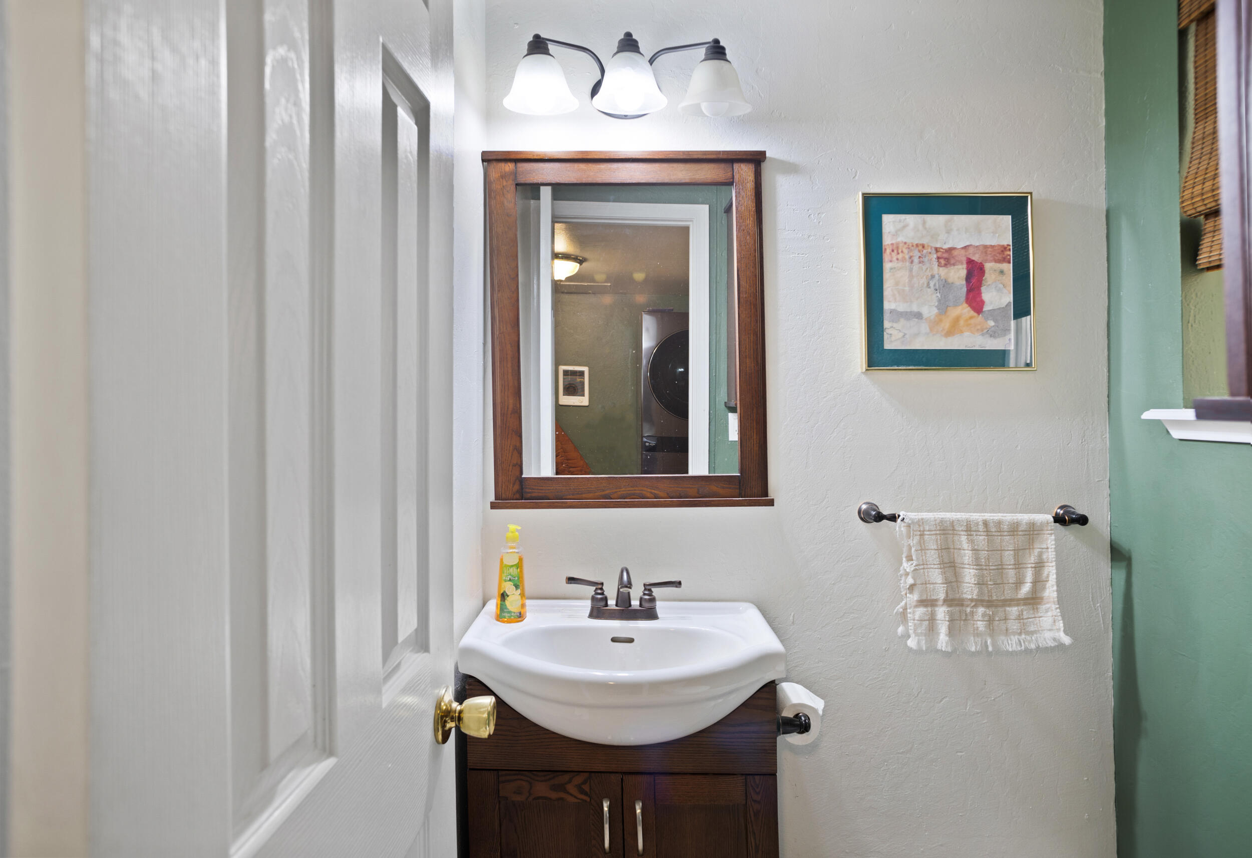 255 Queens Branch Road Rogue River, OR 97537 - Photo 29 of 60 a bathroom with a sink and a mirror