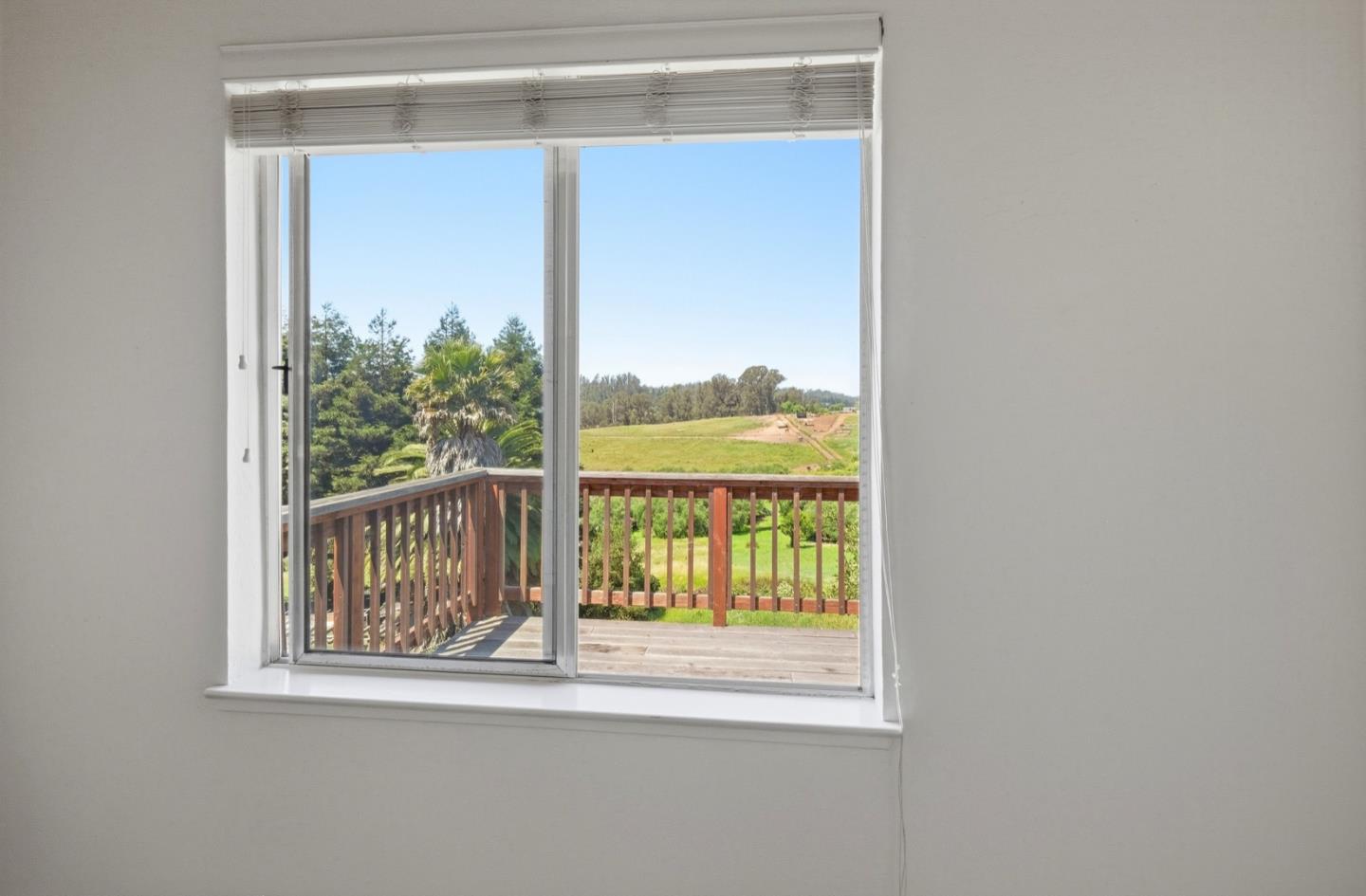 215 Manfre Road Watsonville, CA 95076 - Photo 22 of 36 a view of a room that has a large window and front door
