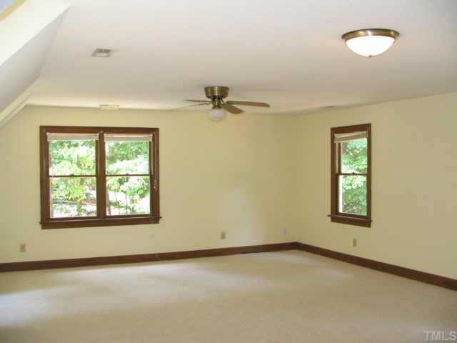808 Thatcher Way Raleigh, NC 27615 - Photo 7 of 10 an empty room with a window