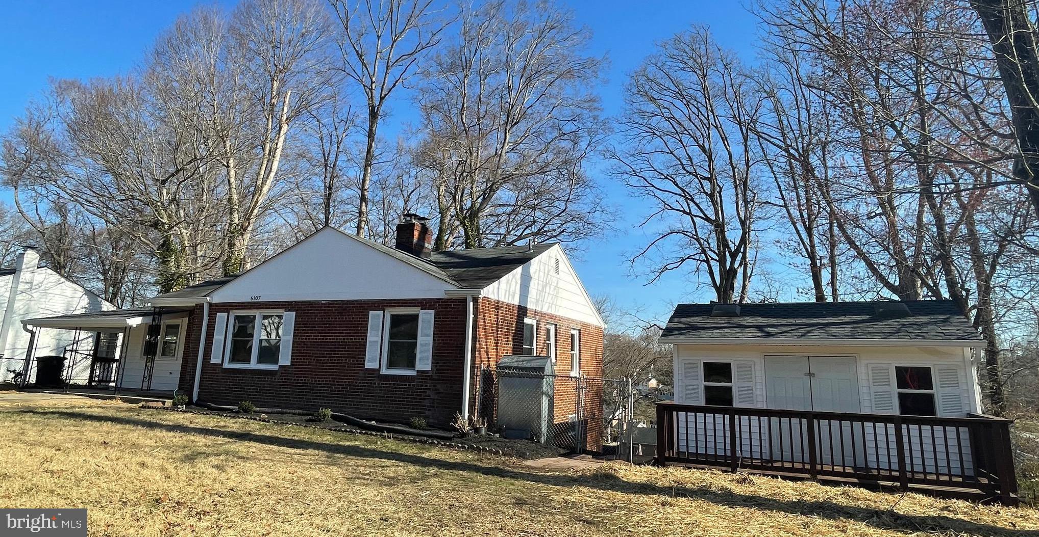 6107 Buckler Road Clinton, MD 20735 - Photo 39 of 45 a front view of a house with a yard