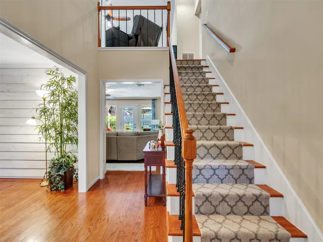 a view of entryway with wooden floor