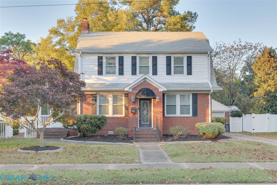 144 Meredith Street Hampton, VA 23669 - Photo 2 of 36 a front view of a house with garden