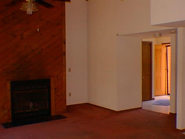 613 Mountain View Way Bushkill, PA 18324 - Photo 3 of 3 a view of an empty room with a fireplace
