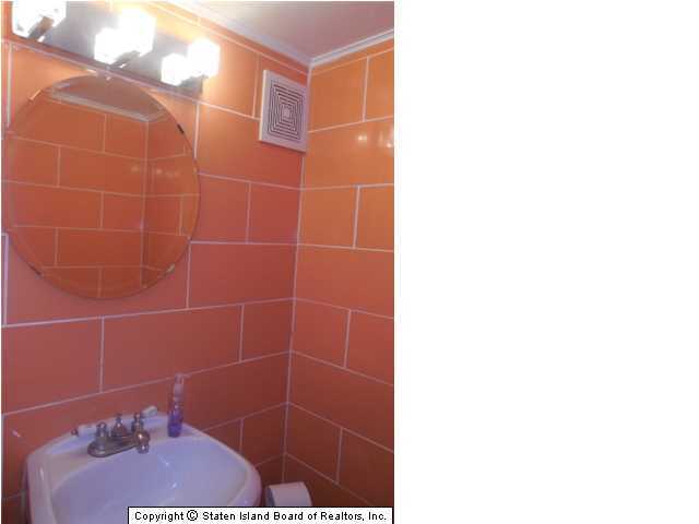 1640 Forest Hill Road Staten Island, NY 10314 - Photo 16 of 20 a bathroom with a shower