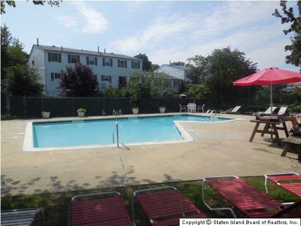 1640 Forest Hill Road Staten Island, NY 10314 - Photo 18 of 20 a view of a swimming pool with a patio