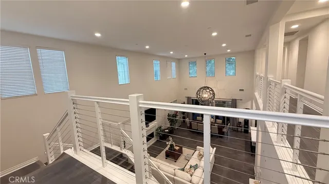 a view of a hallway with windows