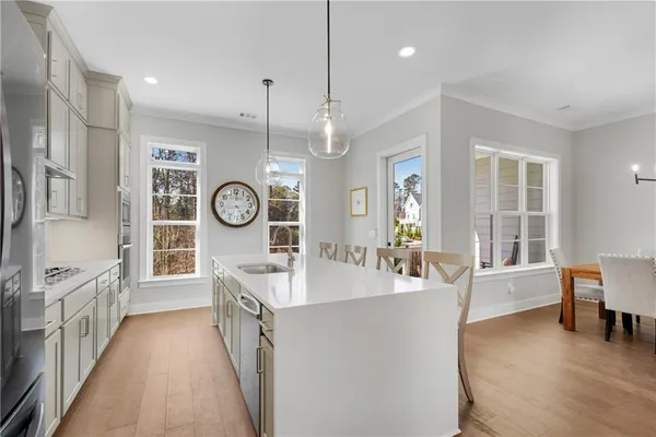 a bed room with a bed and a ceiling fan