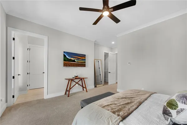 a living room with furniture a air conditioner and a window