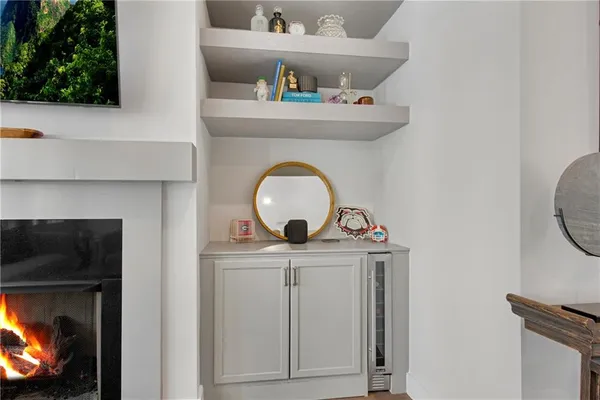 a view of a balcony with wooden fence
