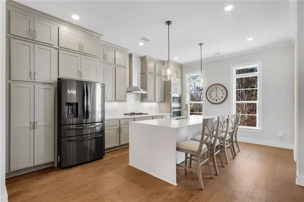 a bed room with a bed and a chair