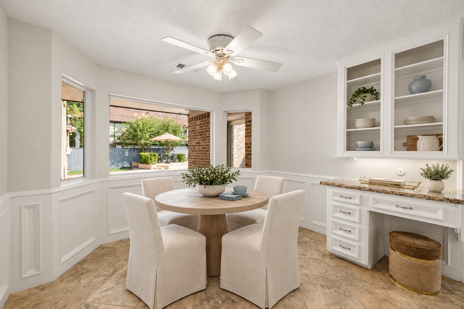 9203 Godstone Lane Spring, TX 77379 - Photo 12 of 38 This Chef’s Desk in the Breakfast Area offers built-in storage and open shelving. This is the perfect place to set-up a charging station or to sit and pay monthly bills. The bay window offers beautiful views of the yard and pool. Image has been virtually staged.