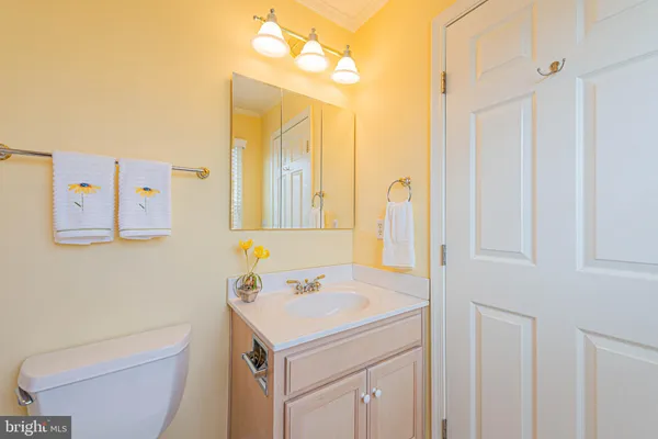 a view of a room with rack on the wall and a window