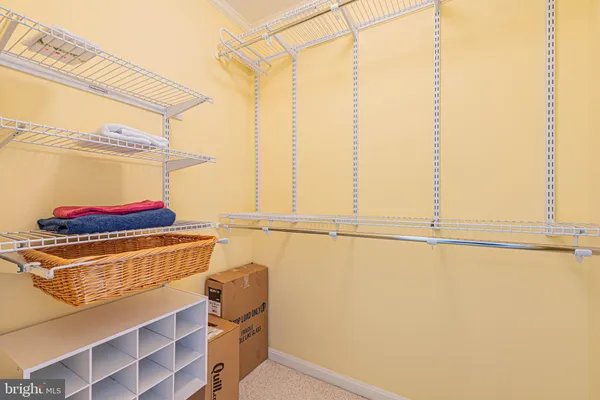 a view of a house with swimming pool and sitting area